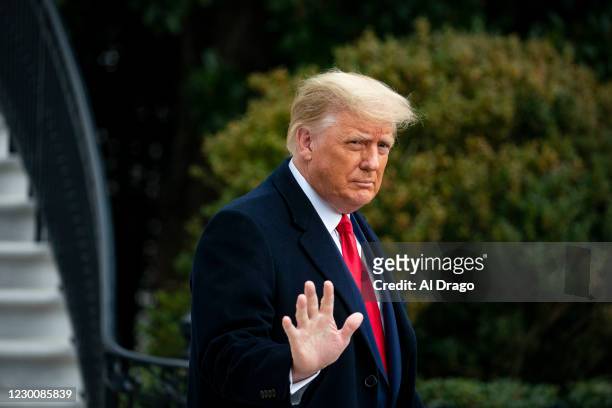 President Donald Trump waves as he departs on the South Lawn of the White House, on December 12, 2020 in Washington, DC. Trump is traveling to the...