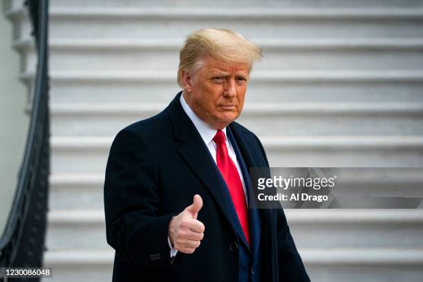 President Donald Trump gives a thumbs up as he departs on the South Lawn of the White House, on December 12, 2020 in Washington, DC. Trump is...
