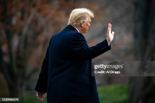 President Donald Trump waves as he departs on the South Lawn of the White House, on December 12, 2020 in Washington, DC. Trump is traveling to the...