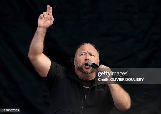 Far-right radio show Alex Jones speaks to supporters of US President Donald Trump as they demonstrate in Washington, DC, on December 12 to protest...