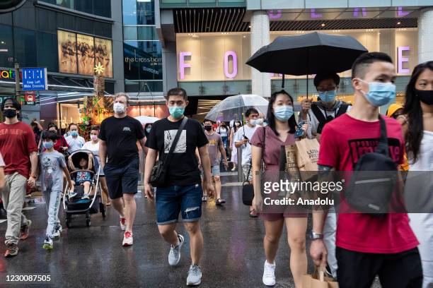 Crowds, in the hundreds, thronged Singapore's shopping belt in preparation for the festive season despite the coronavirus pandemic which has recorded...
