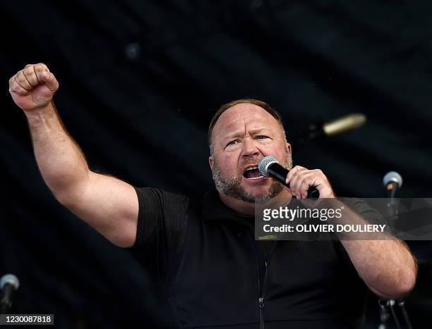 Far-right radio show Alex Jones speaks to supporters of US President Donald Trump as they demonstrate in Washington, DC, on December 12 to protest...