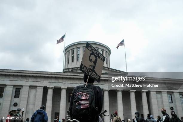 Protesters rally at the Ohio State House in downtown Columbus in protest of the fatal shooting of Casey Goodson Jr. By a Columbus Police Officer on...