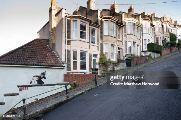 General view of the street where artwork by Banksy appeared on December 12, 2020 in Bristol, England. Banksy claimed the artwork "achoo" as his in a...