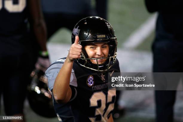Vanderbilt Commodores place kicker Sarah Fuller gives a thumbs up after successfully kicking her second point after attempt during a game between the...