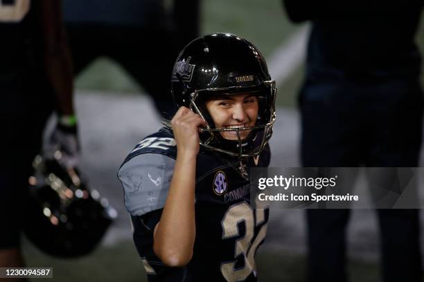 Vanderbilt Commodores place kicker Sarah Fuller smiles to cheers for her in the stands after successfully kicking her second point after attempt...