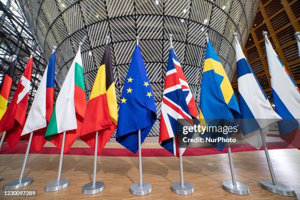 Flags of the European Union EU and the United Kingdom UK / Great Britain among all the other European flags in Forum Europa Building in Brussels,...