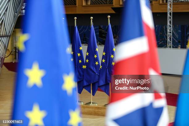 Flags of the European Union EU and the United Kingdom UK / Great Britain among all the other European flags in Forum Europa Building in Brussels,...