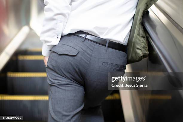 going up escalators in osaka - arse stock pictures, royalty-free photos & images