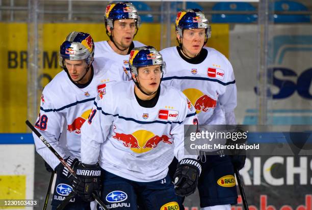 Frank Mauer, Keith Aulie, Dominik Kahun and Philip Gogulla of EHC Red Bull Muenchen celebrate after scoring the 0:1 during the game between the...