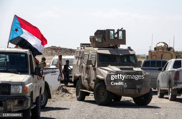 Vehicles of fighters loyal to Yemen's separatist Southern Transitional Council are seen in Yemen's southern Abyan province, on December 13 during a...