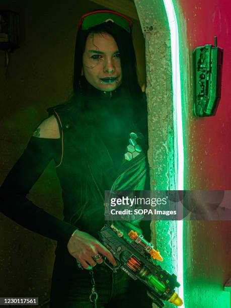 Cosplay girl at the Cyberpunk Festival. Russian gaming enthusiasts dress up as video game characters of the Cyberpunk 2077 during the Cyberpunk...
