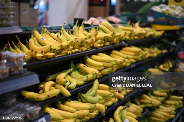 Loose bananas are seen for sale in a Tesco supermarket in London on December 14, 2020. With just over two weeks to go until Britain leaves the EU...