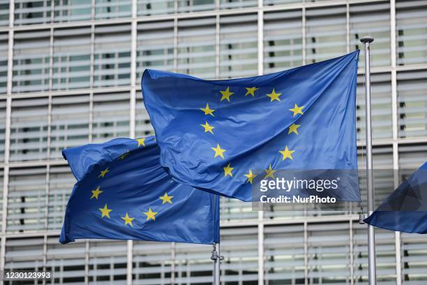 Flags of Europe waving as seen on a pole. The European Flag is the symbol of Council of Europe COE and the European Union EU as seen in the Belgian...