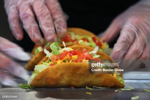 Tacos are made to order at the new Taco Bell Cantina in Brookline, MA on Dec. 4, 2020. The new Taco Bell on Boston University's campus on...