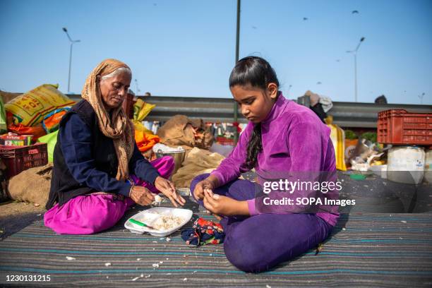 Sukhvinder Kaur a 13 year old girl helps to prepare meals during the demonstration. Students of different age groups have been helping farmers in...