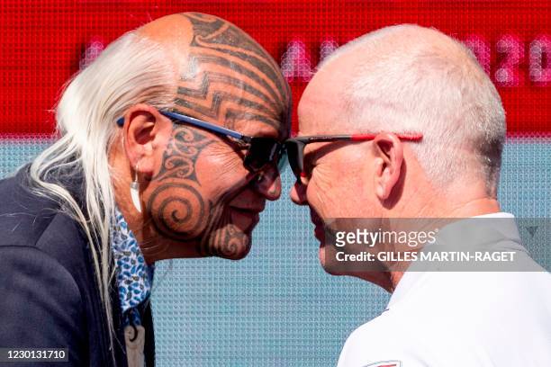 American Magic team skipper Terry Hutchinson receives a traditional Maori 'hongi' greeting during an opening ceremony in Auckland on December 15...