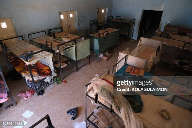 An empty dormitory full of wares of schoolboys is seen after gunmen abducted students at the Government Science school in Kankara, in northwestern...
