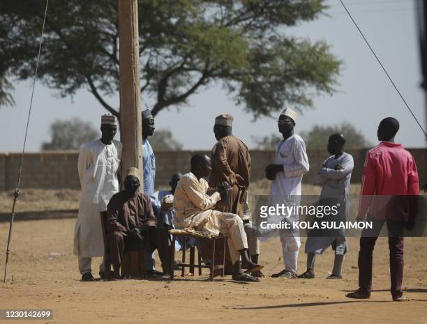 Parents wait outside the Government Science where gunmen abducted students in Kankara, in northwestern Katsina state, Nigeria December 15, 2020. -...