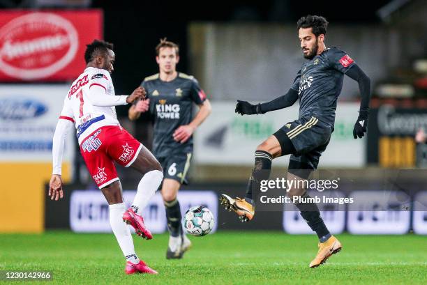 Mousa Tamari of OH Leuven battles for possession with Fabrice Olinga of Royal Excel Mouscron during the Jupiler Pro League match between Royal Excel...