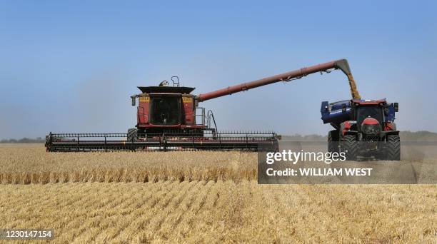 Photo taken on December 14, 2020 shows a paddock of barley being harvested on a farm near Inverleigh, some 100kms west of Melbourne.