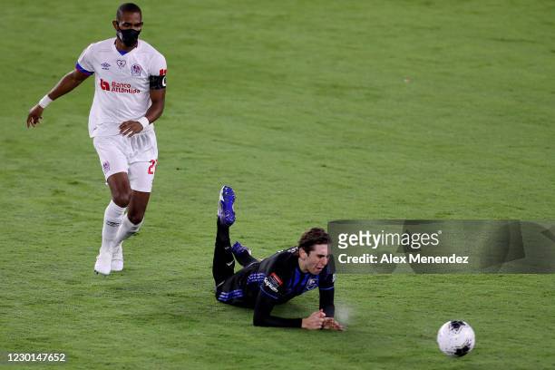 Luis Binks of Montreal Impact gets tripped up by Jerry Bengston of CD Olimpia during the CONCACAF Champions League quarterfinal game at Exploria...