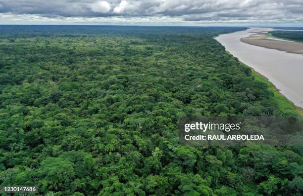 Aerial view of the Amazonas river near Leticia, Amazona sdepartment, Colombia on November 20, 2020. - Located on the banks of the Amazon river, an...