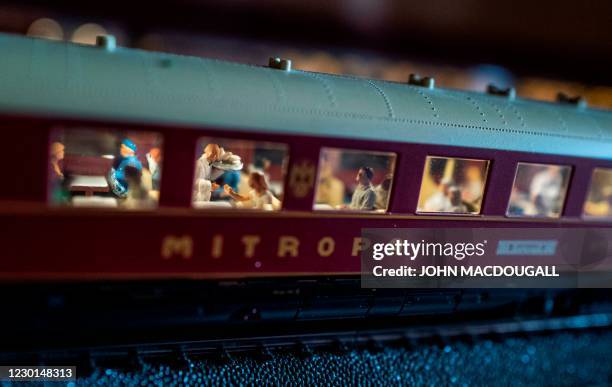Mitropa dining carriage, complete with model waiters, is seen in model train enthusiast Gerhard Berndt's "train cabinet", in his living room in...