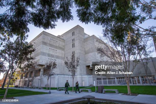 December 15: Orange County Sheriffs deputies walk past the Orange County Central Men's Jail in Santa Ana Tuesday, Dec. 15, 2020. An Orange County...