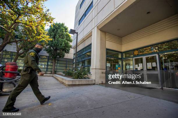 December 15: An Orange County Sheriffs deputy walks into the Intake and Release center at the the Orange County Central Men's Jail in Santa Ana...
