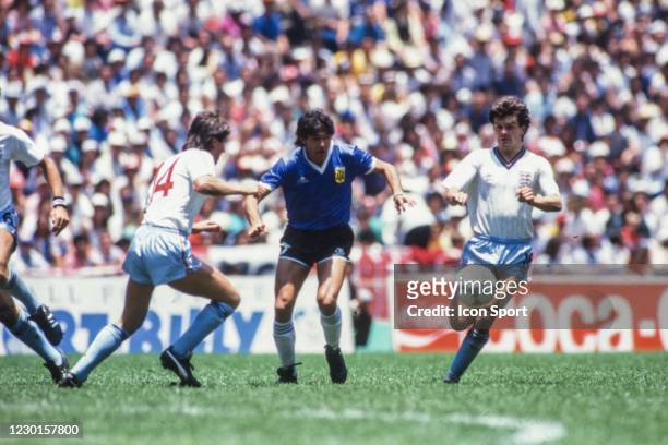 Jorge Burruchaga of Argentina and Terry Fenwick, Steve Hodge of England during the Quarter-Final FIFA World Cup 1986 match between Argentina and...
