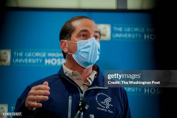 Secretary Alex Azar speaks to the media at George Washington University Hospital after the administration of some of the nations first doses of a...