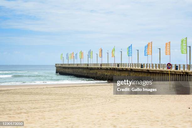 Empty beaches and closed North beach pier during beach closures on December 16, 2020 in Durban, South Africa. The beach promenade walk remained open....
