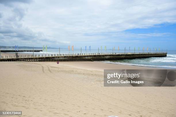 Empty beach showers during beach closures on December 16, 2020 in Durban, South Africa. The beach promenade walk remained open. This follows new...