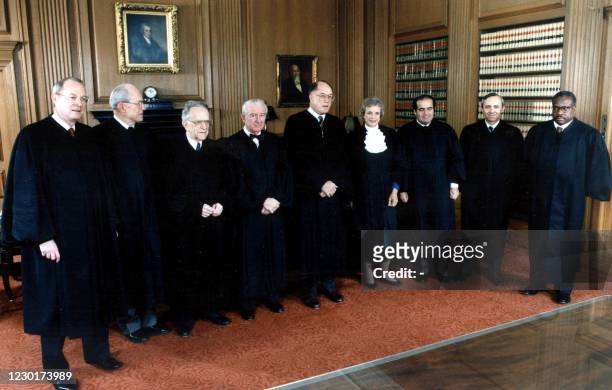 Members of the United States Supreme Court stand for a portrait 01 October 1991 in Washington,DC. From left to right, Anthony M. Kennedy, Byron R....