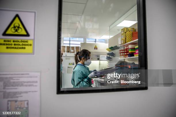 Medical worker prepares documents inside the laboratory during a phase 3 trial of the Johnson & Johnson Covid-19 vaccine by the Germans Trias i Pujol...
