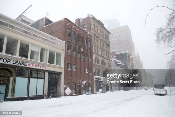 Snow blows around on Boylston Street as a snow squall blows through on December 17, 2020 in Boston, Massachusetts. More than a foot of snow is...