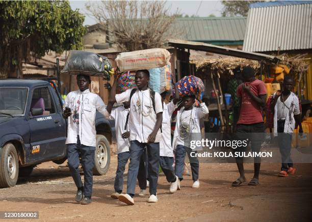 Boarding school children returns back home after government close down schools in northwestern, Nigeria due to the abduction of students kidnapped by...