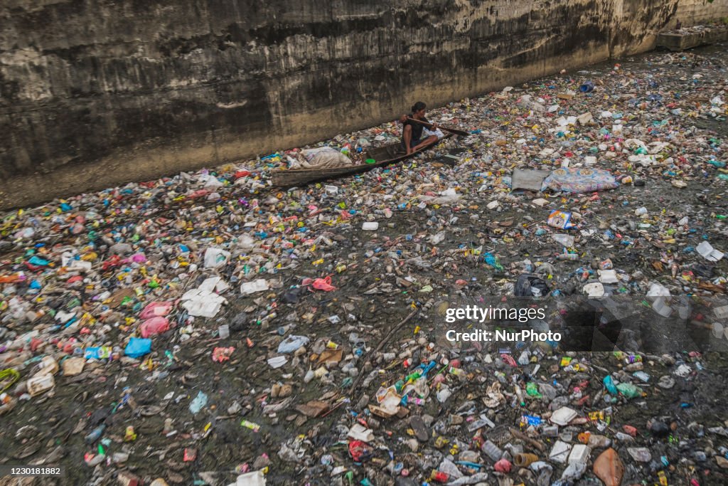 Siak River Covered By Plastic Waste In Pekanbaru, Indonesia