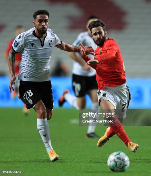 Rafa Silva of SL Benfica with Silvio of Vitoria SC in action during the Portuguese League Cup match between SL Benfica and Vitoria SC at Estadio da...