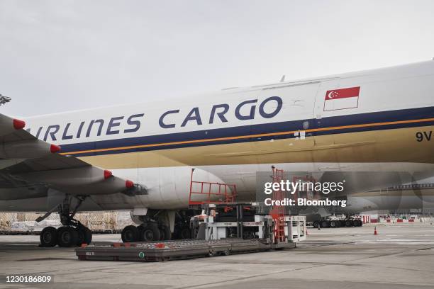 Singapore Airlines Ltd. Cargo aircraft at Changi Airport in Singapore, on Wednesday, Dec. 16, 2020. SATS is preparing for the arrival of its first...