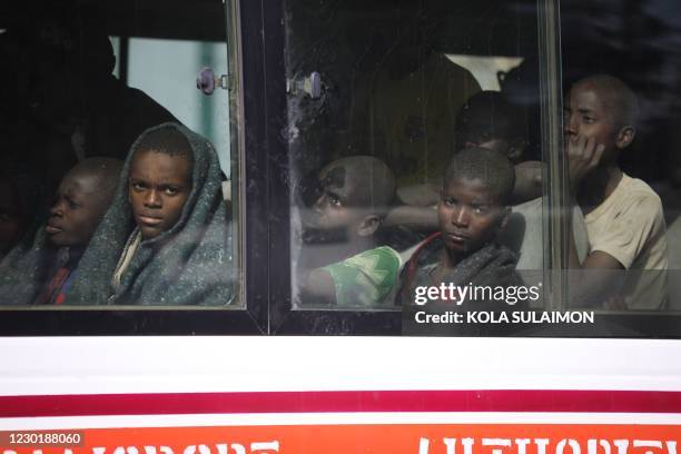 Children kidnapped by Boko Haram from the Government Science Secondary school, in Kankara, in northwestern Katsina State, Nigeria are seen returning...