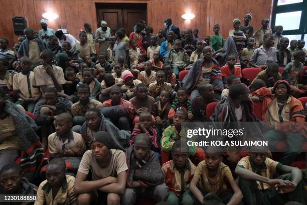 Released students gather at the Government House with other students from the Government Science Secondary school, in Kankara, in northwestern...