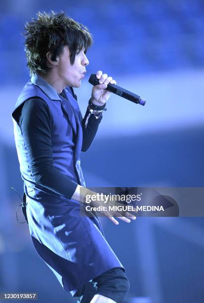 Singer Nicola Sirkis performs on stage with his French rock band Indochine at the Stade de France in Saint-Denis, outside Paris on June 26 as part of...