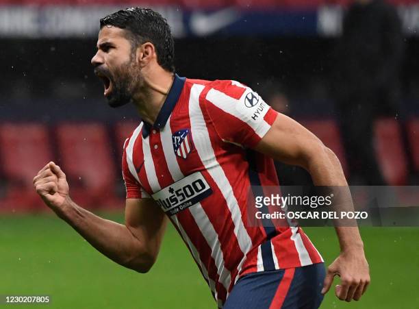 Atletico Madrid's Spanish forward Diego Costa celebrates his goal during the Spanish league football match between Club Atletico de Madrid and Elche...