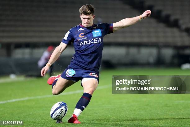 Bordeaux' French fly half Matthieu Jalibert kicks the ball for a penalty conversion during the European Rugby Champions Cup rugby union match between...