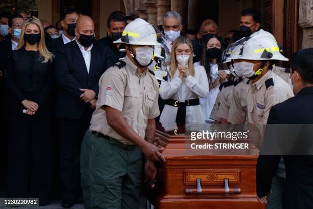 Relatives of the former governor of Jalisco Aristoteles Sandoval -murdered in Puerto Vallarta early this week- walk next to his coffin on its way to...