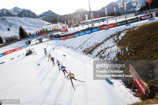 Marte Olsbu Roeiseland of Norway, Tiril Eckhoff of Norway and Clare Egan of the United States of America lead the field into the stadium after the...