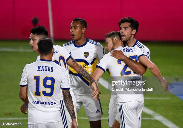 Franco Soldano of Boca Juniors celebrates with teammates after scoring the first goal of his team during a Zona Campeonato match between...