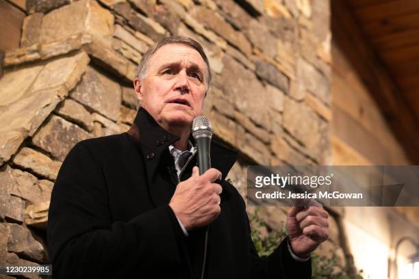 Georgia Republican Senate candidate David Perdue speaks to the crowd during a campaign rally with former U.N. Ambassador Nikki Haley on December 20,...